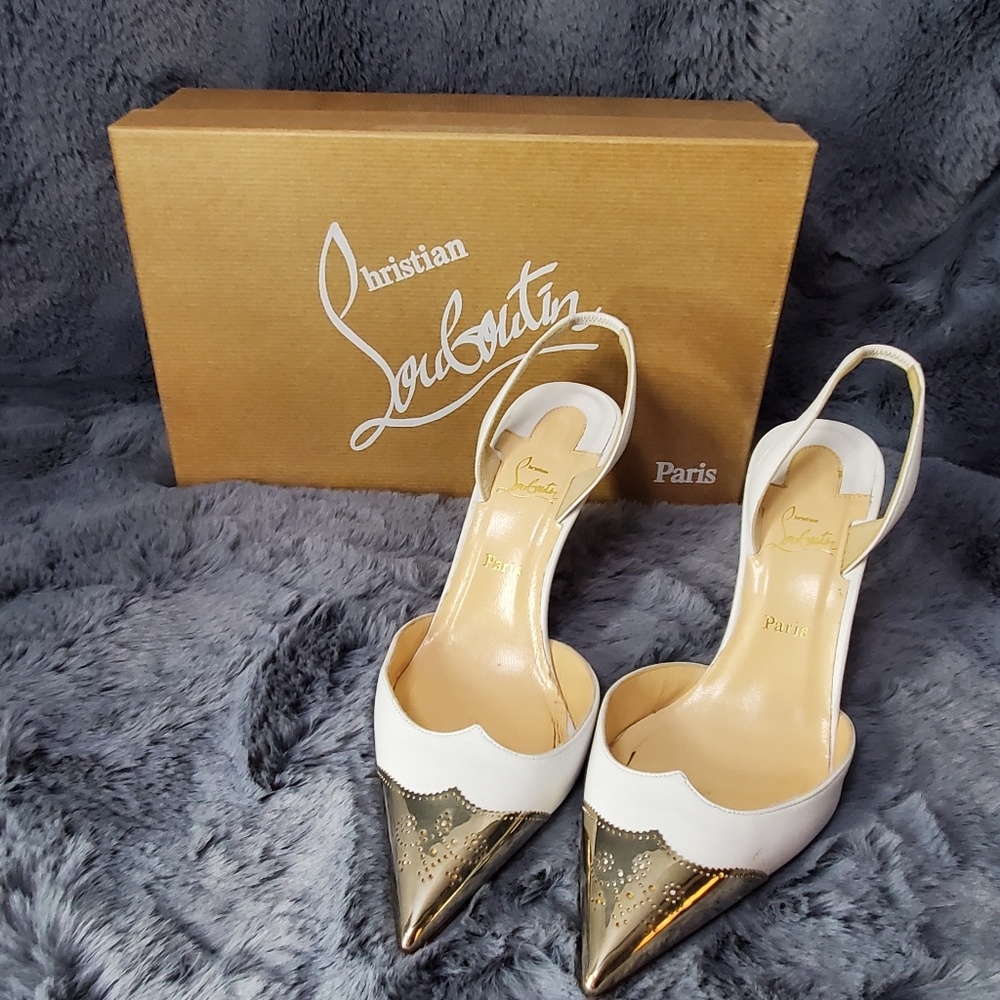 White and gold Louboutin shoes